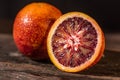 Whole and cut ripe juicy Sicilian Blood oranges Royalty Free Stock Photo