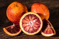 Whole and cut ripe juicy Sicilian Blood oranges Royalty Free Stock Photo