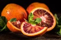 Whole and cut ripe juicy Sicilian Blood oranges Royalty Free Stock Photo