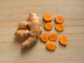 Whole and cut Turmeric root Royalty Free Stock Photo