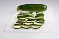 The whole and cut vegetable marrow Royalty Free Stock Photo
