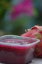 Whole Dragon Fruit with Fresh Pitaya Pulp in Containe Royalty Free Stock Photo