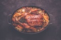 Whole Duck Roasted with Potatoes, Carrots and Oranges