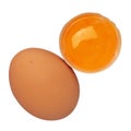 Whole egg and egg yolk in shell isolated on white Royalty Free Stock Photo