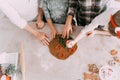 Family baking cookies together at home kitchen. Royalty Free Stock Photo