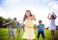 Whole Family Hula Hooping Outdoors Royalty Free Stock Photo