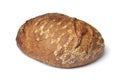 Whole fresh baked German dinkel wheat bread on white background