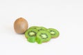 Whole fresh kiwi fruit and slices isolatet on white background with copy space for text Royalty Free Stock Photo