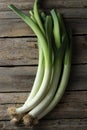 Whole fresh leeks on wooden table, top view Royalty Free Stock Photo