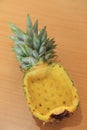 Whole fresh pineapple fruit without core for use as a bowl for served pineapple fried rice recipe