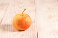 Whole fresh red apples closeup on wooden rural boards, vega food. yellow ripe fresh apple