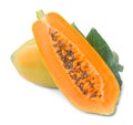 Whole fresh ripe orange papaya with half and leaves isolated on white background with clipping path Royalty Free Stock Photo