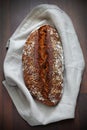 Whole-grain artisan bread loaf with seeds and oats Royalty Free Stock Photo