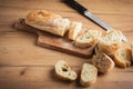 Whole grain bread close-up on the wooden cutting board Royalty Free Stock Photo