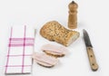 Whole grain bread. Two slices with ham and knife Royalty Free Stock Photo