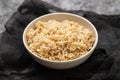 Whole grain brown rice cooked in small bowl Royalty Free Stock Photo