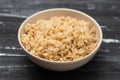 Whole grain brown rice cooked in small bowl Royalty Free Stock Photo