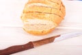 Whole Grain Loaf of Bread Sliced on Cutting Board Royalty Free Stock Photo