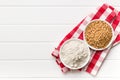 Whole grain wheat flour and wheat grains Royalty Free Stock Photo