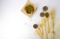 Whole grains such as mung beans, white sesame and barley on wooden spoon and sackcloth on white background. Royalty Free Stock Photo