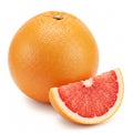 Whole grapefruit and a slice, isolated on a white Royalty Free Stock Photo