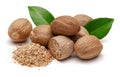 Whole and grated nutmeg with leaves isolated
