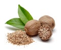 Whole and grated nutmeg with leaves isolated