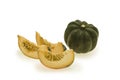 Whole green gourd and pumpkin slices Royalty Free Stock Photo