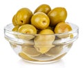 Whole green olives in a small transparent glass round bowl isolated on white background Royalty Free Stock Photo
