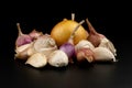 Whole group pile ingredient of fresh onion garlic isolated on black background Royalty Free Stock Photo