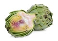 Whole and half artichoke isolated on white Royalty Free Stock Photo