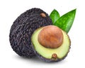 Whole and half avocado with green leaves isolated on white Royalty Free Stock Photo