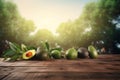 Whole and half avocado with leaves on rustic wooden table with nature sunlight. Generate ai