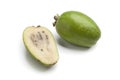 Whole and half fresh Feijoa fruit