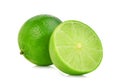Whole and half fresh green lime on white Royalty Free Stock Photo