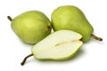 Whole and half fresh sweet sugar pears close up on white background