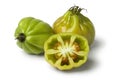 Whole and half green Coeur de boeuf tomatoes Royalty Free Stock Photo