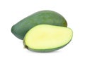 Whole and half green mango isolated on white Royalty Free Stock Photo