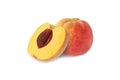 Whole and half peach with stone isolated Royalty Free Stock Photo