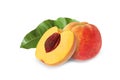 Whole and half peach with stone and leaf isolated Royalty Free Stock Photo