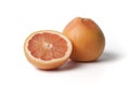 Whole and half pink grapefruit