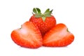 Whole and half red strawberry isolated on the white Royalty Free Stock Photo