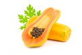 Whole and half of ripe papaya fruit with seeds on white background Royalty Free Stock Photo