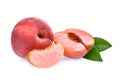 Whole and half with slice of peach with green leaves isolated