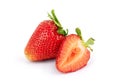 Whole and half strawberries on a white background Royalty Free Stock Photo