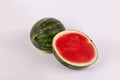 One whole watermelon one half sweet organic seedless watermelon