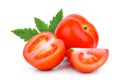 Whole and half tomato with green leaf isolated on white Royalty Free Stock Photo