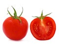 Whole and a half tomato with water drops Royalty Free Stock Photo