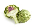 Whole and halved fresh artichoke