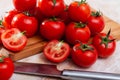 Whole and halved tomatoes Royalty Free Stock Photo